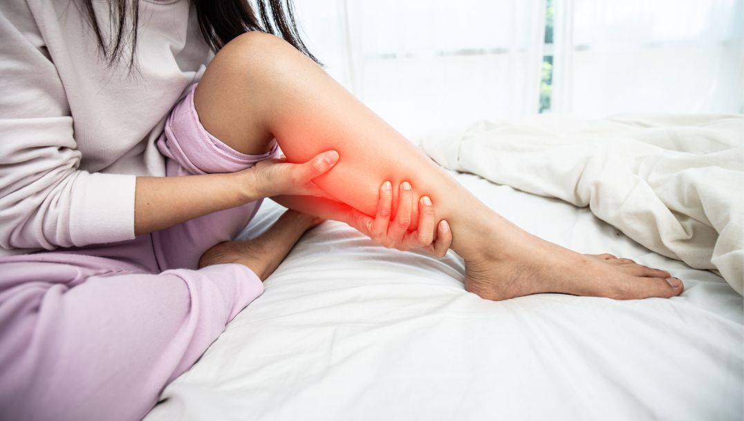woman experiencing leg pain